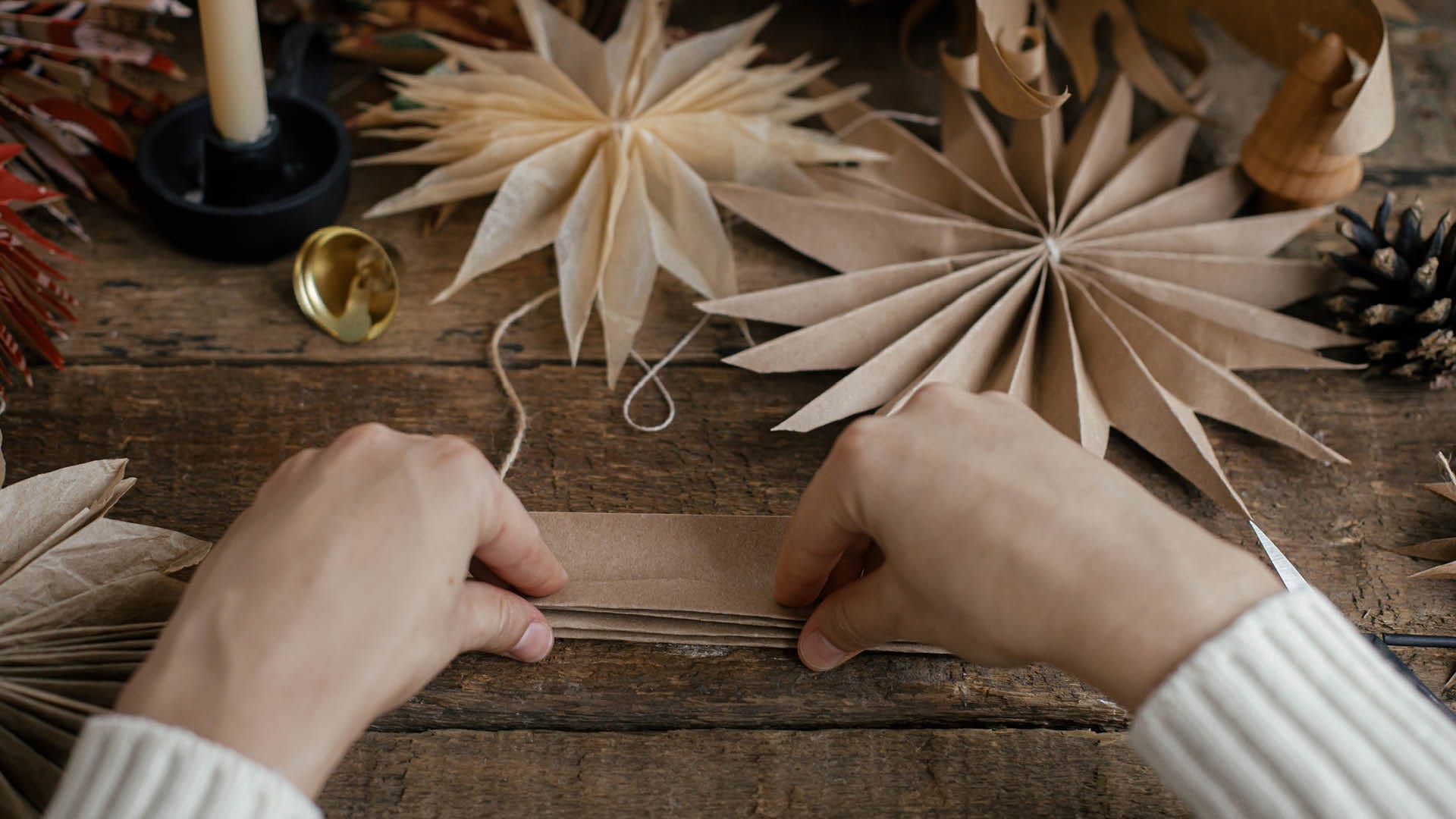 a person folding paper