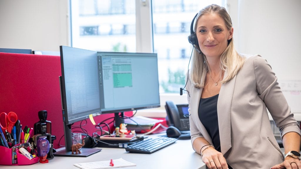 A female employee wearing a headset