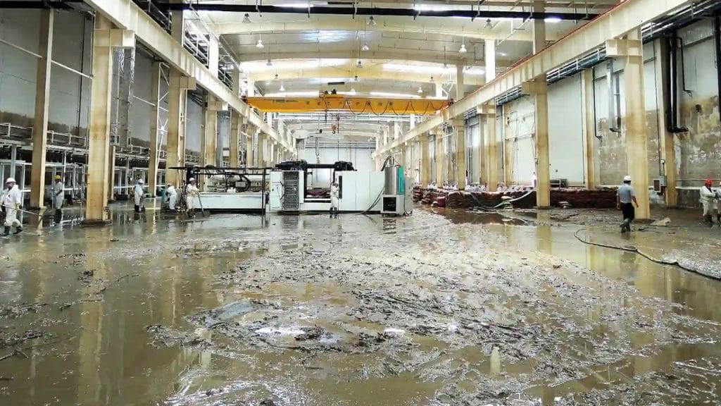 A Warehouse flooded with mud