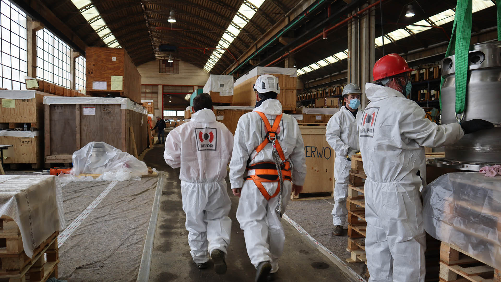 A group of BELFOR employees clearing out a warehouse