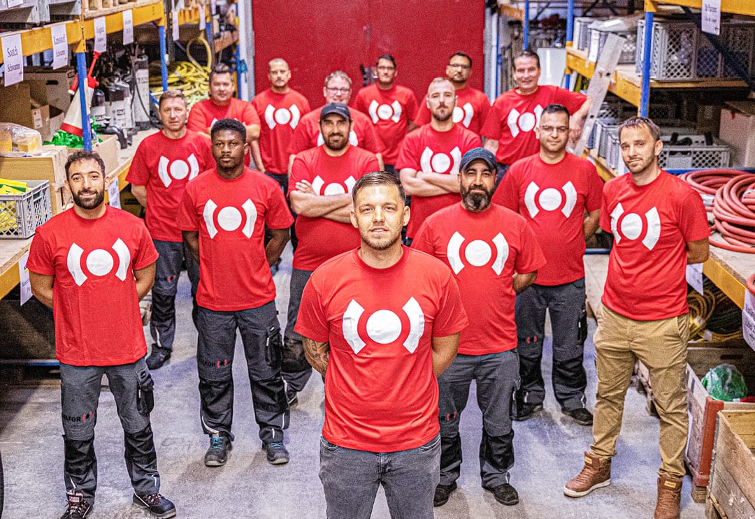 A male BELFOR team in a warehouse