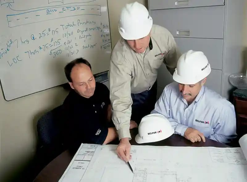 Three consultants discussing a project