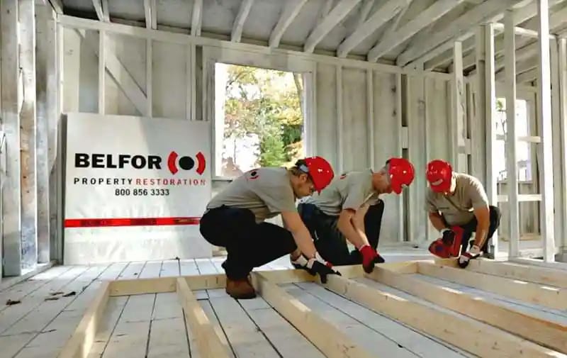 Belfor team works on the reconstruction of a house after a storm