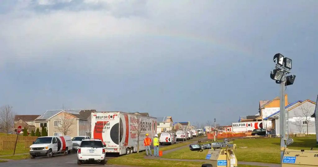 Belfor trucks assisting after storm damages