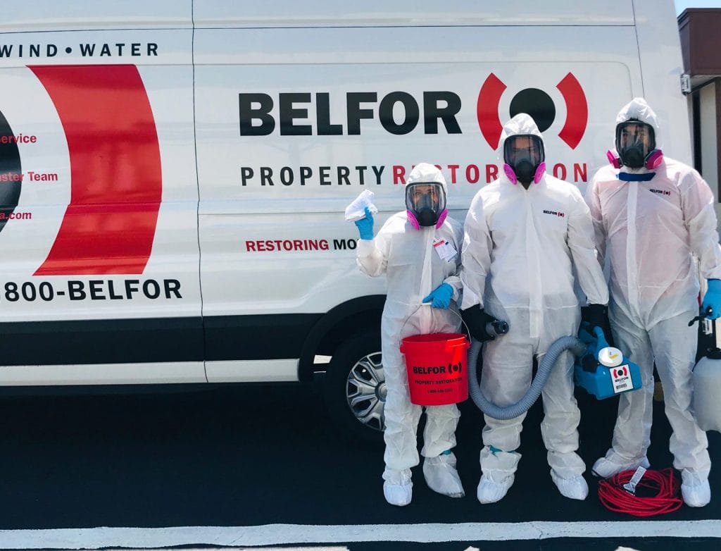 BELOFR employees wearing hazmat suits